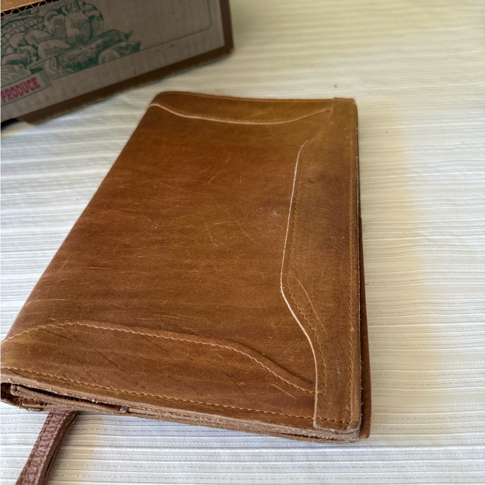 Sophisticated Brown Leather Wristlet with Vintage Patina
